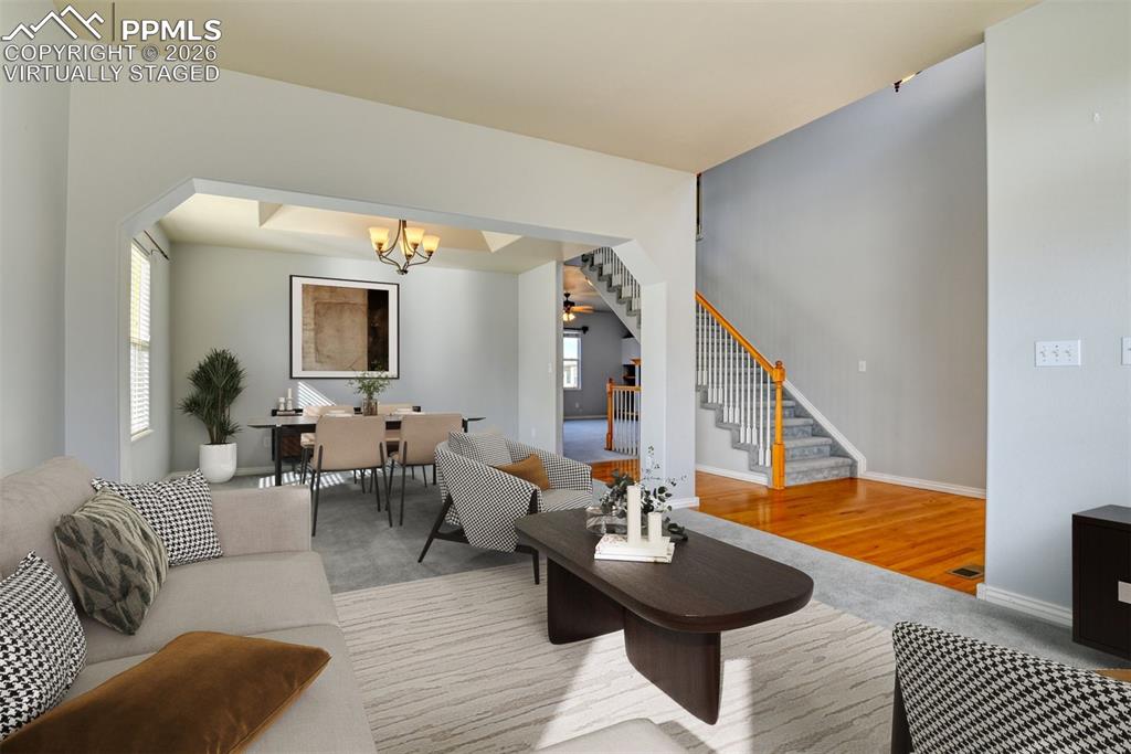 Undisclosed Address Colorado Springs, CO 80921 - Photo 9 of 49 a living room with furniture and wooden floor