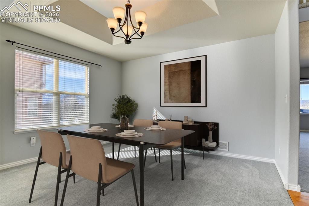 Undisclosed Address Colorado Springs, CO 80921 - Photo 10 of 49 a dining room with furniture and window