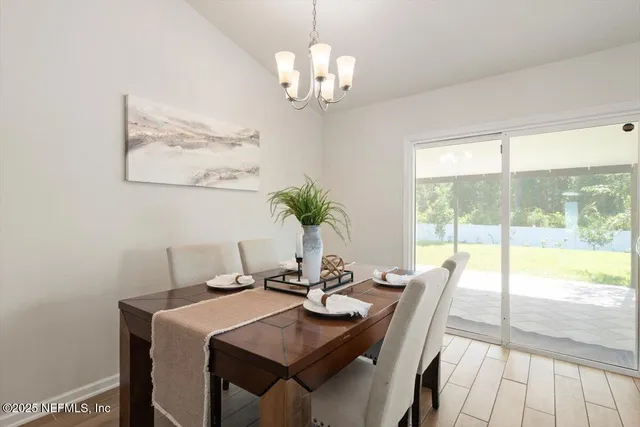 a en suite bathroom with a double vanity sink and mirror