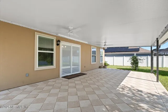 an aerial view of a house with a garden