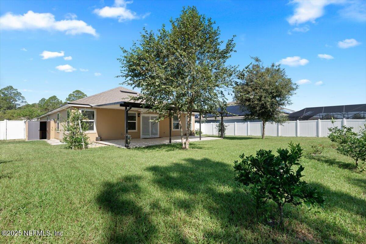 88 North Hamilton Springs Road St. Augustine, FL 32084 - Photo 46 of 73 a view of a house with a backyard