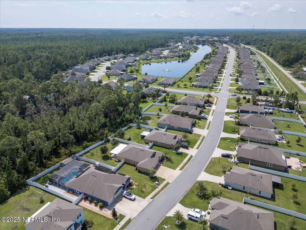 88 North Hamilton Springs Road St. Augustine, FL 32084 - Photo 55 of 73 an aerial view of a house with a garden