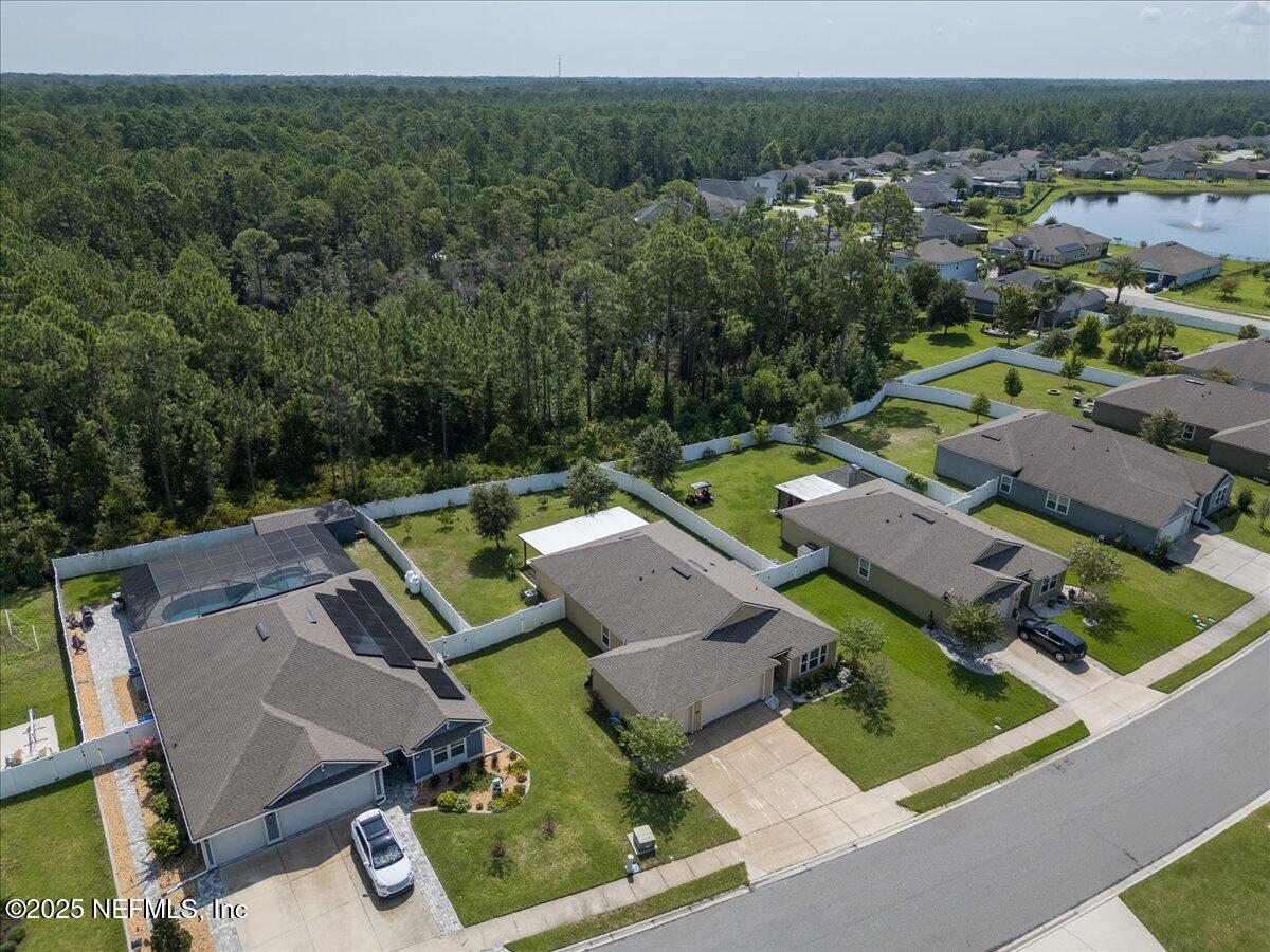 88 North Hamilton Springs Road St. Augustine, FL 32084 - Photo 56 of 73 an aerial view of a house with a garden