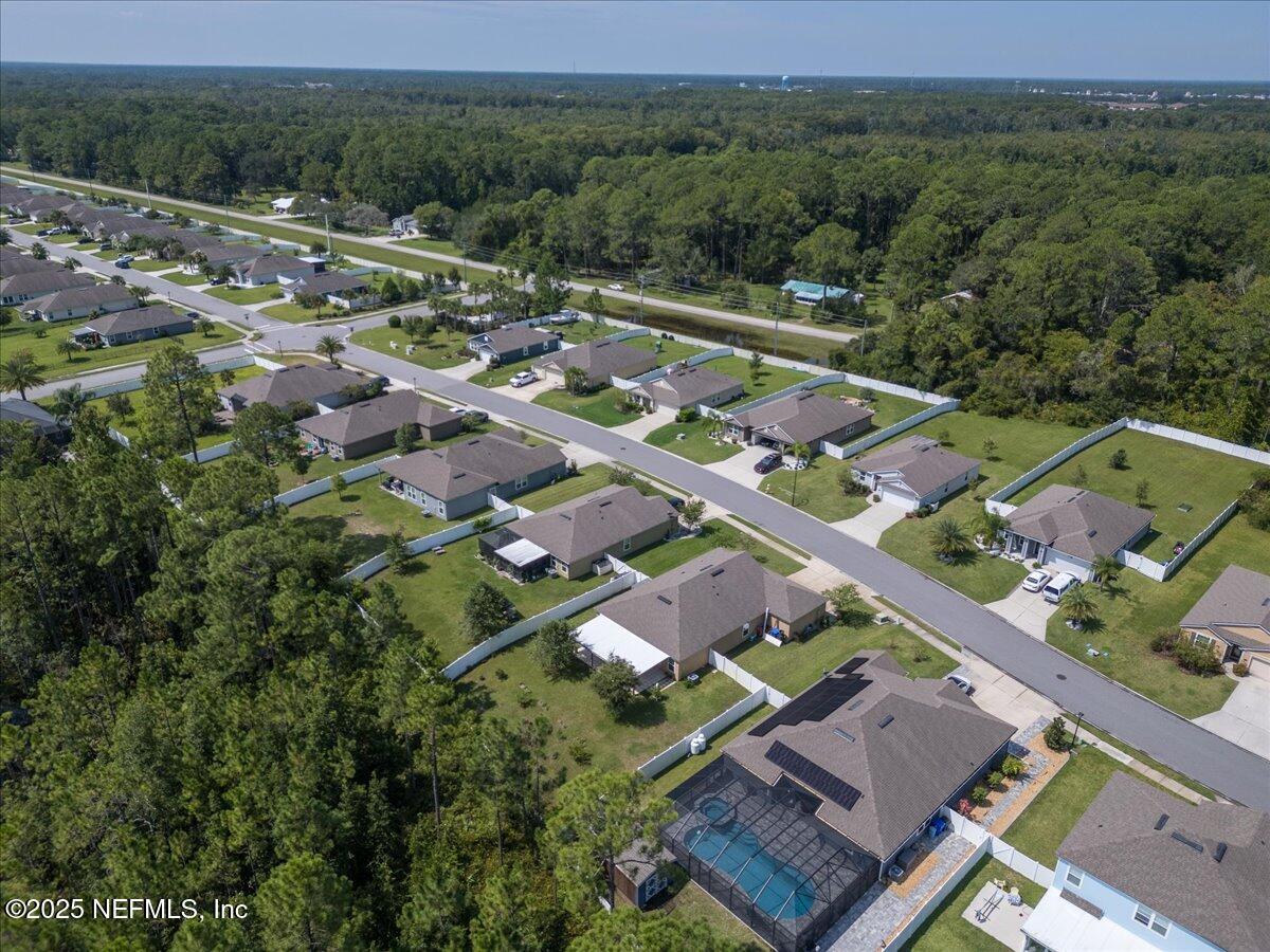 88 North Hamilton Springs Road St. Augustine, FL 32084 - Photo 58 of 73 an aerial view of residential houses with outdoor space