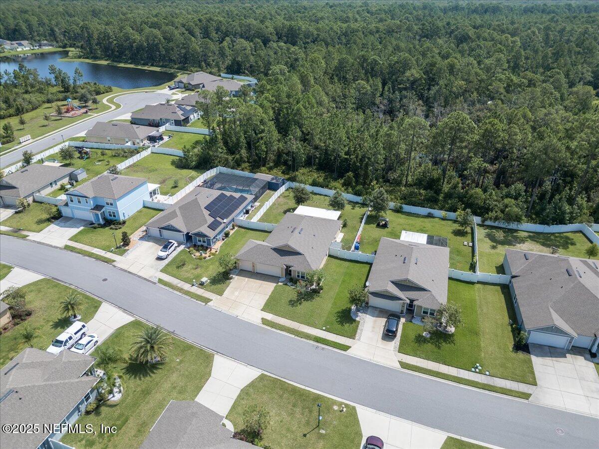 88 North Hamilton Springs Road St. Augustine, FL 32084 - Photo 63 of 73 an aerial view of residential houses with outdoor space