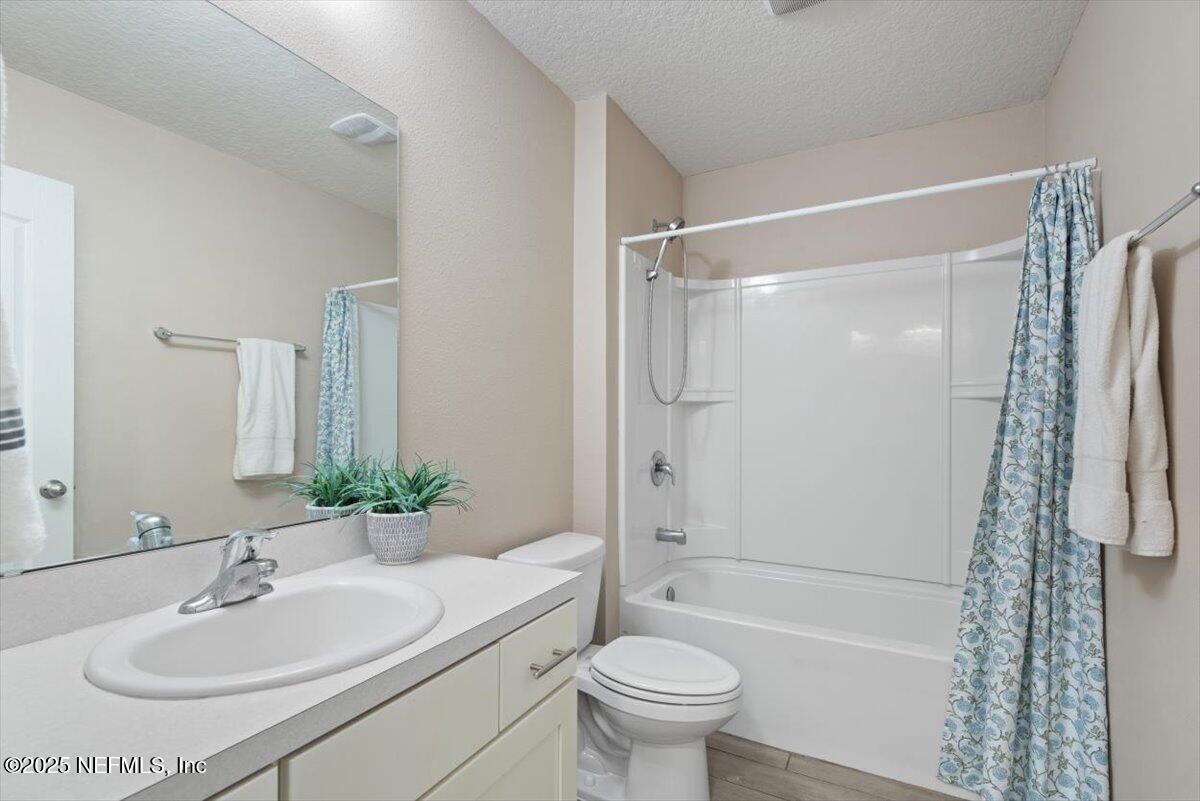 88 North Hamilton Springs Road St. Augustine, FL 32084 - Photo 9 of 73 a bathroom with a sink toilet and shower