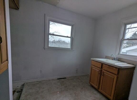 14271 Woodbury Road Haslett, MI 48840 - Photo 9 of 14 Laundry