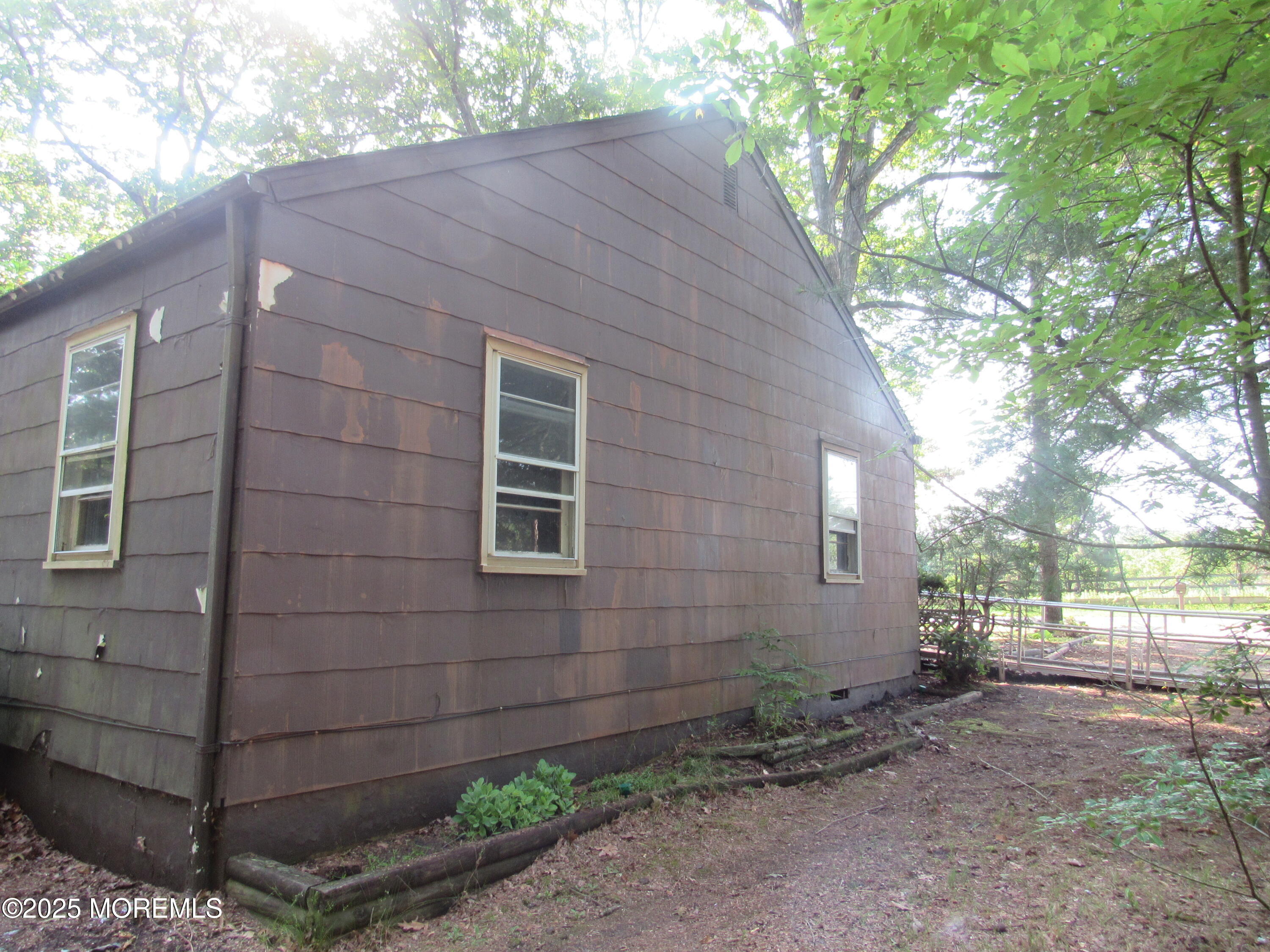 752 Hulses Corner Road Howell, NJ 07731 - Photo 6 of 18 a backyard of a house