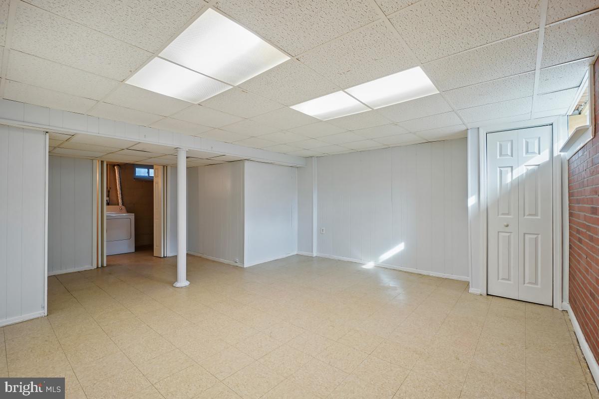 162 Cherrydell Road Baltimore, MD 21228 - Photo 25 of 31 Spacious, versatile basement retreat.