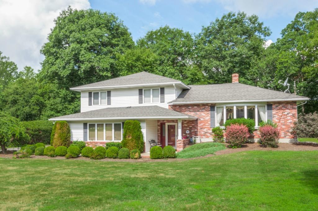 21 Timber Hill Road Prospect, CT 06712 - Photo 1 of 1 a front view of a house with a yard porch and green space
