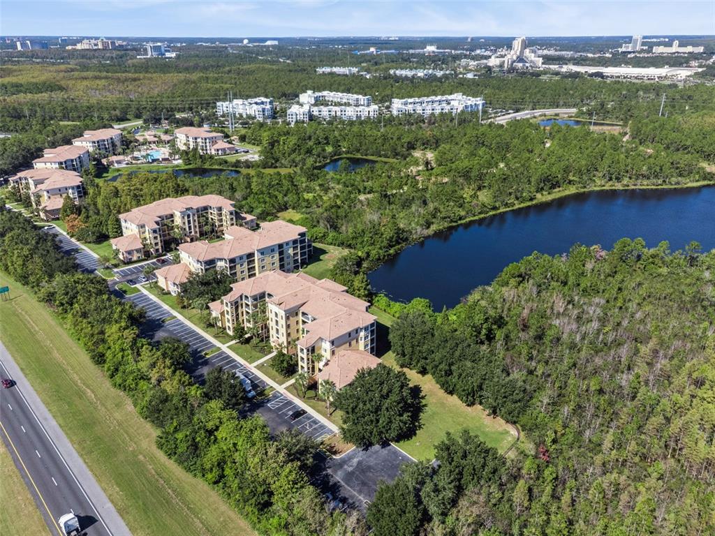 8774 Worldquest Boulevard, Unit 7307 Orlando, FL 32821 - Photo 36 of 52 an aerial view of a city with mountains ocean view
