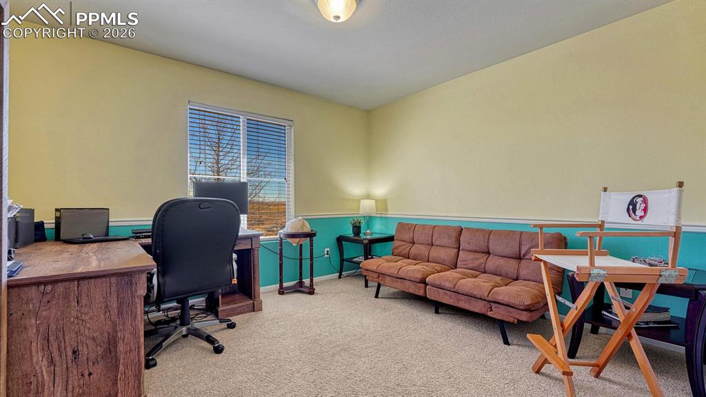 7620 Sandy Springs Point Fountain, CO 80817 - Photo 19 of 24 Large Secondary Bedroom looks out to neighborhood park and pond!