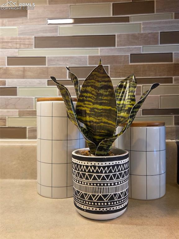 7620 Sandy Springs Point Fountain, CO 80817 - Photo 3 of 24 Custom contemporary backsplash!