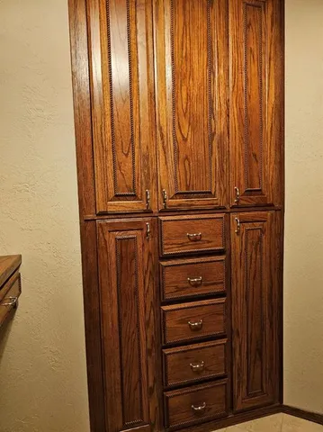 a bathroom with a shower and a sink