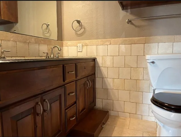a view of a refrigerator in the kitchen