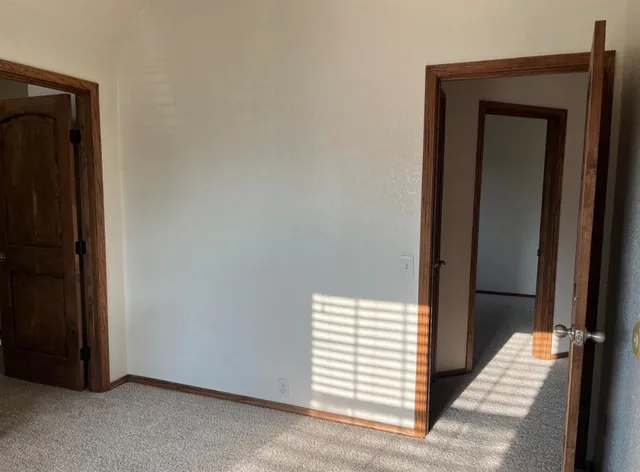 an empty room with windows