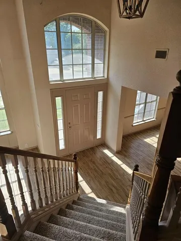 a view of an entryway with a door