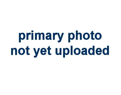 a close up of a white wall