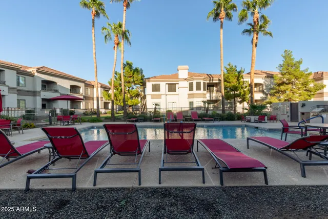 a view of a chairs and tables in patio