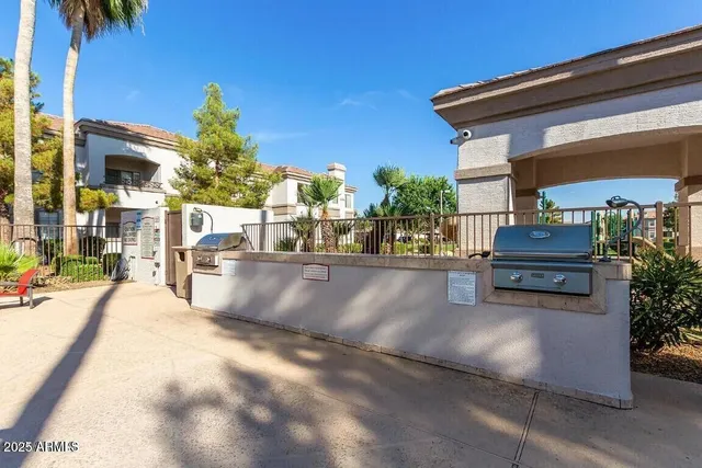 a view of a house with outdoor space and sitting area