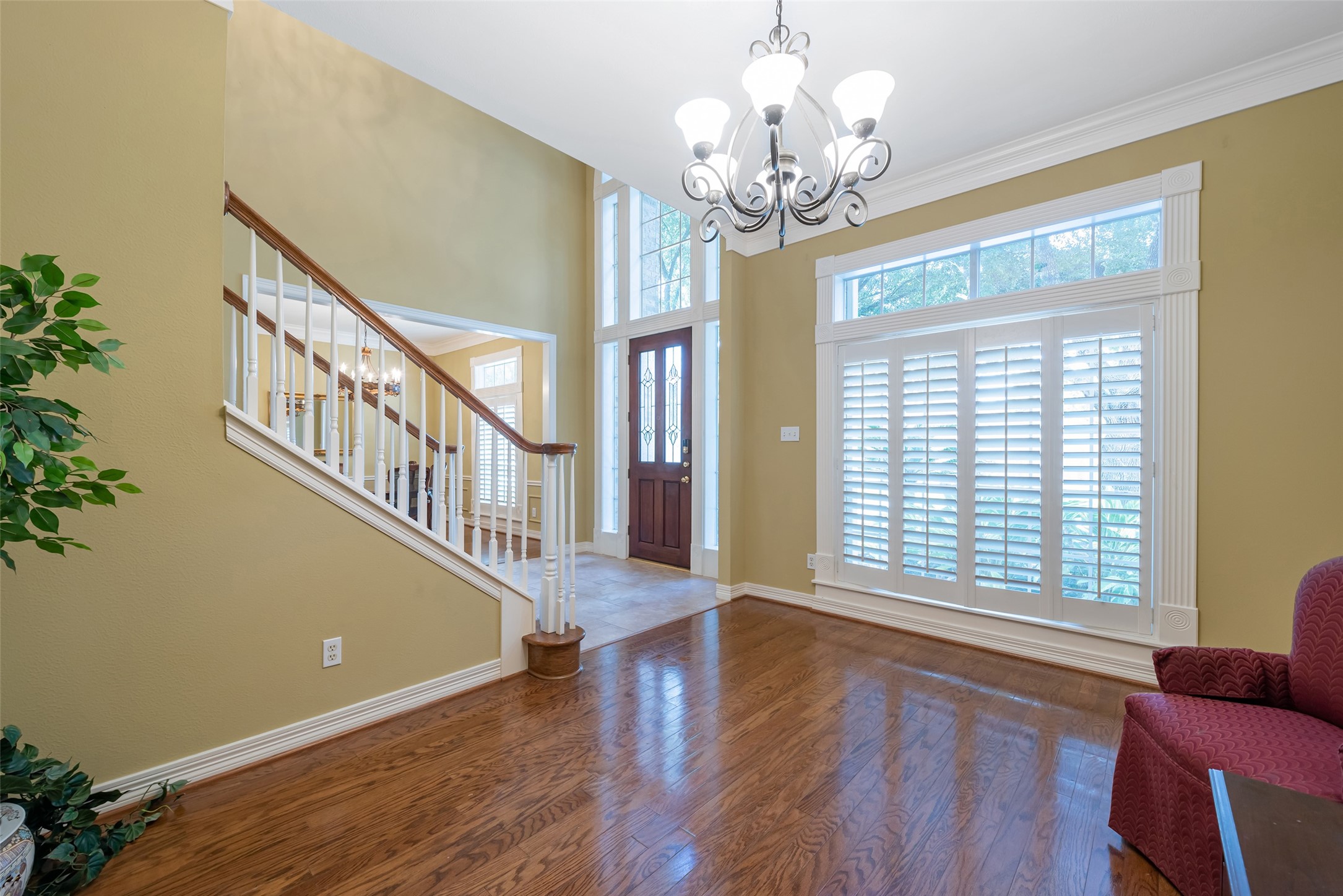 15306 Beecham Drive Houston, TX 77068 - Photo 4 of 48 Luxury abounds with the plantation shutters and the gleaming wood floors.