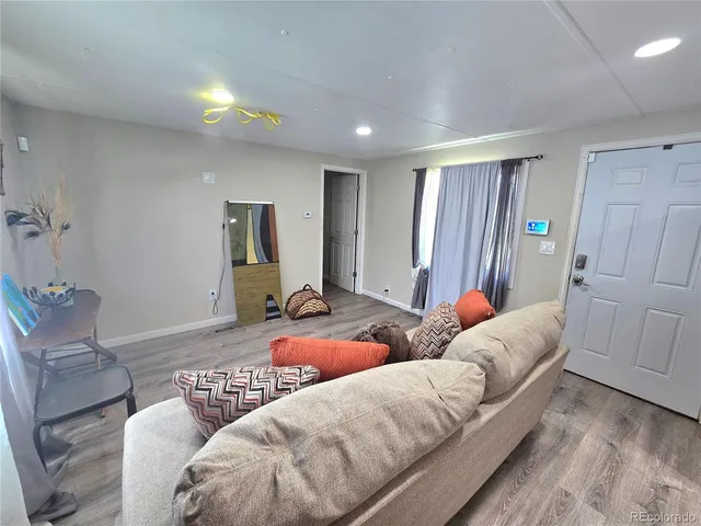 a living room with furniture and a couch