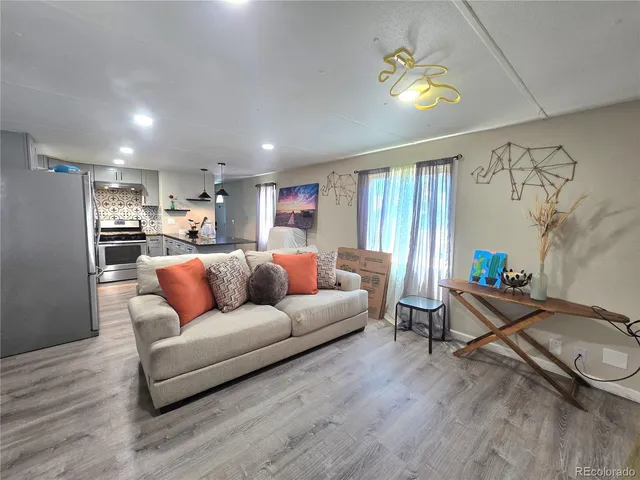 a living room with furniture and a couch