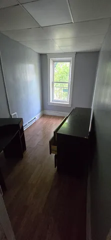 a room with window and gate