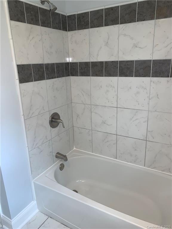 4477 Cureton Ferry Road Catawba, SC 29704 - Photo 13 of 20 a bathroom with a bathtub