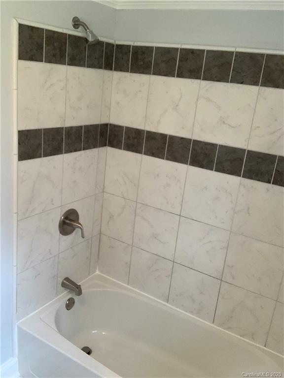 4477 Cureton Ferry Road Catawba, SC 29704 - Photo 15 of 20 a bathroom with a bathtub