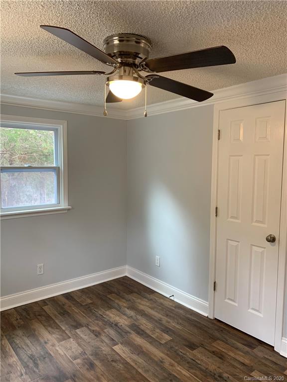 4477 Cureton Ferry Road Catawba, SC 29704 - Photo 17 of 20 a view of empty room with wooden floor