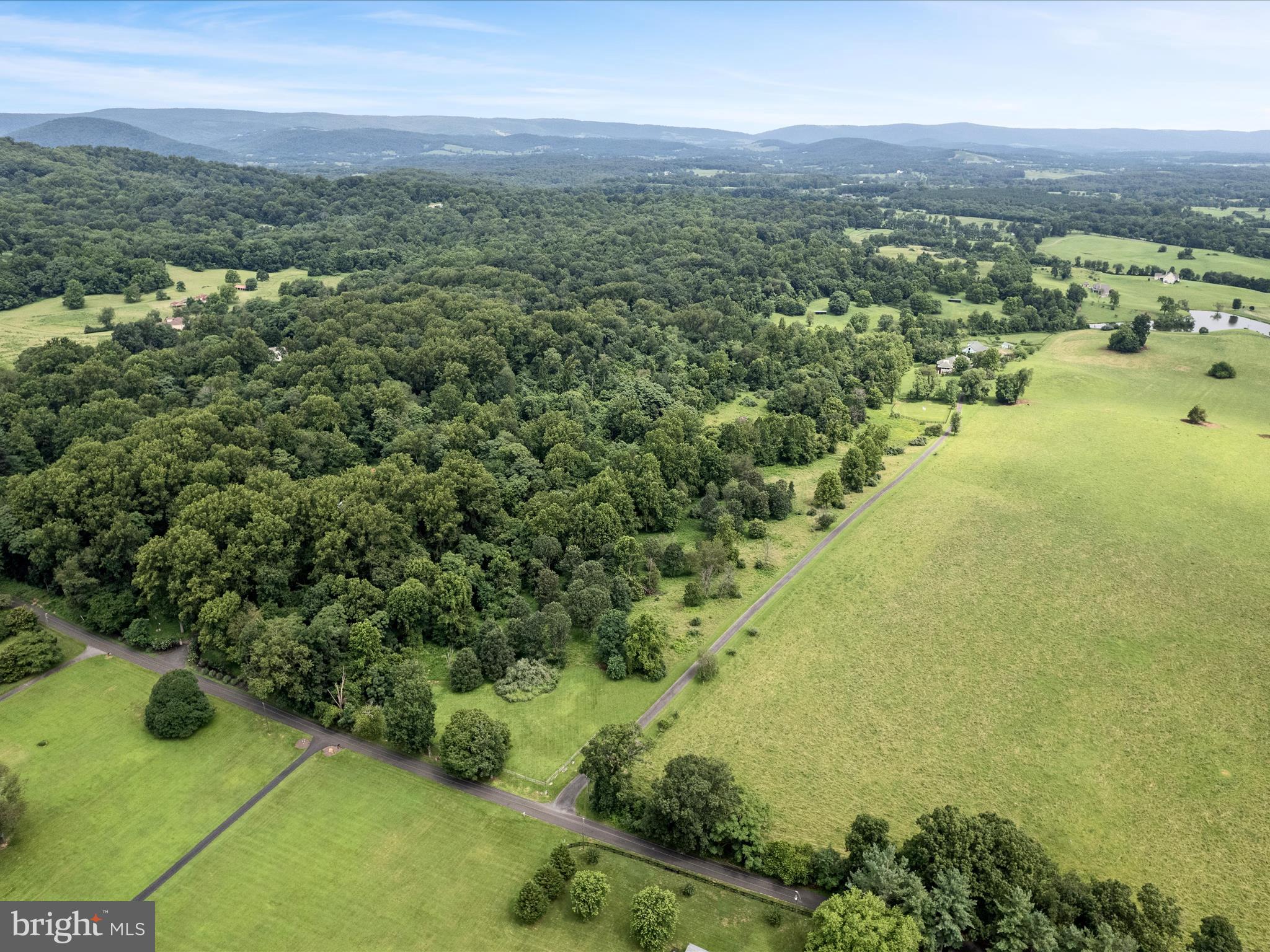 3959 Cobbler Mountain Road Delaplane, VA 20144 - Photo 105 of 106 a view of a lake with a city