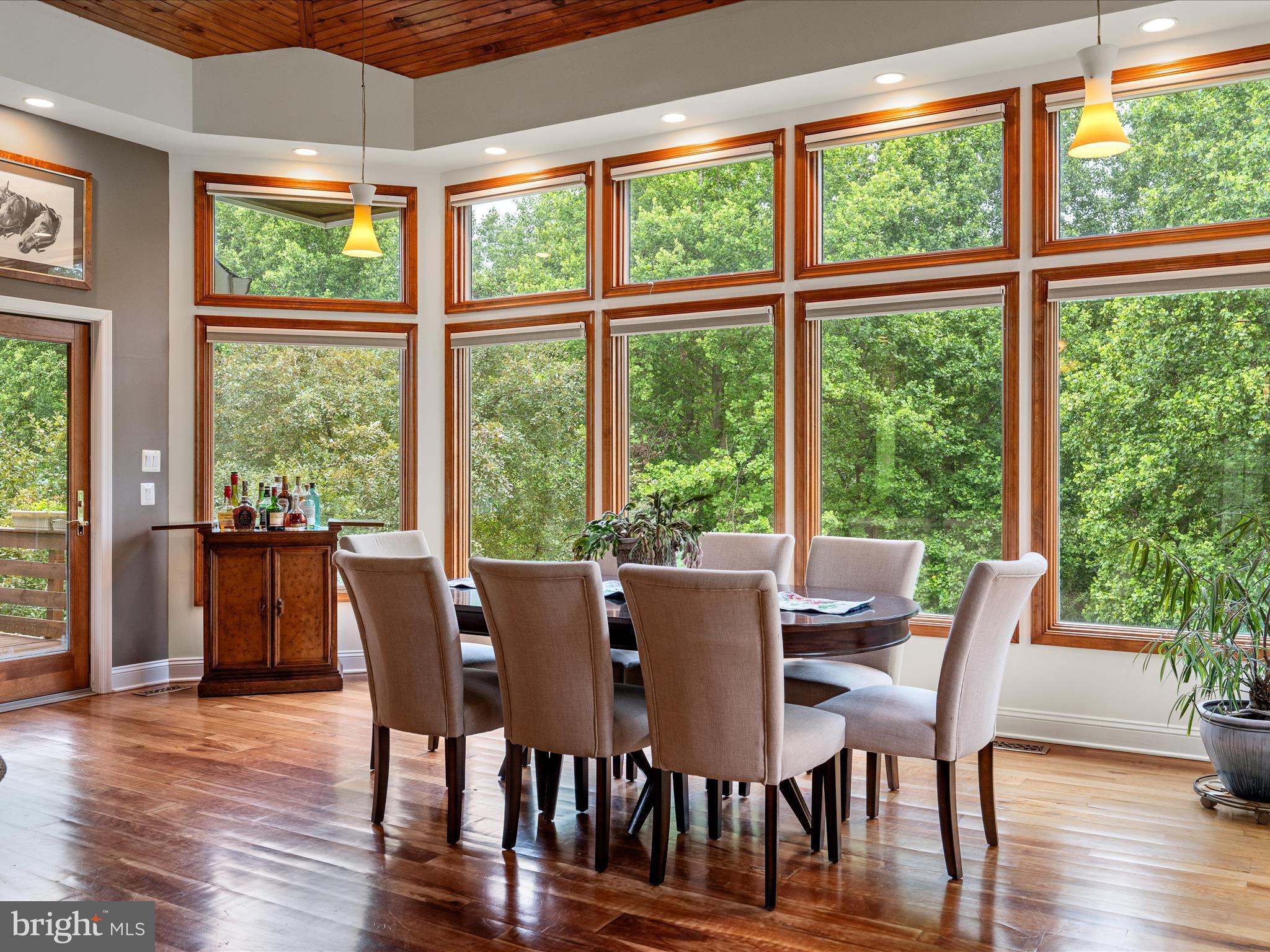 3959 Cobbler Mountain Road Delaplane, VA 20144 - Photo 26 of 106 a view of a dining room with furniture window and wooden floor