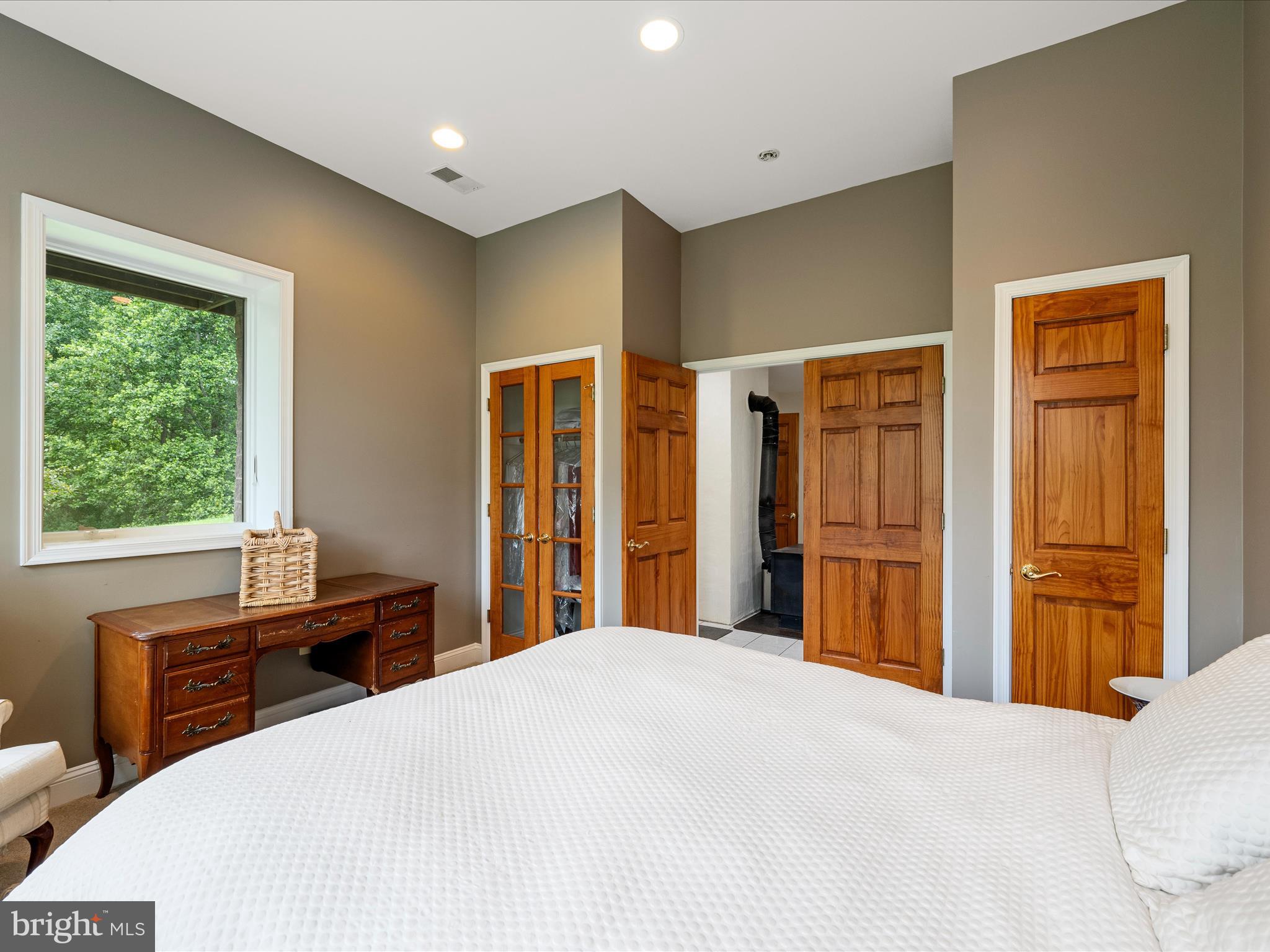 3959 Cobbler Mountain Road Delaplane, VA 20144 - Photo 61 of 106 a bedroom with a bed and a window