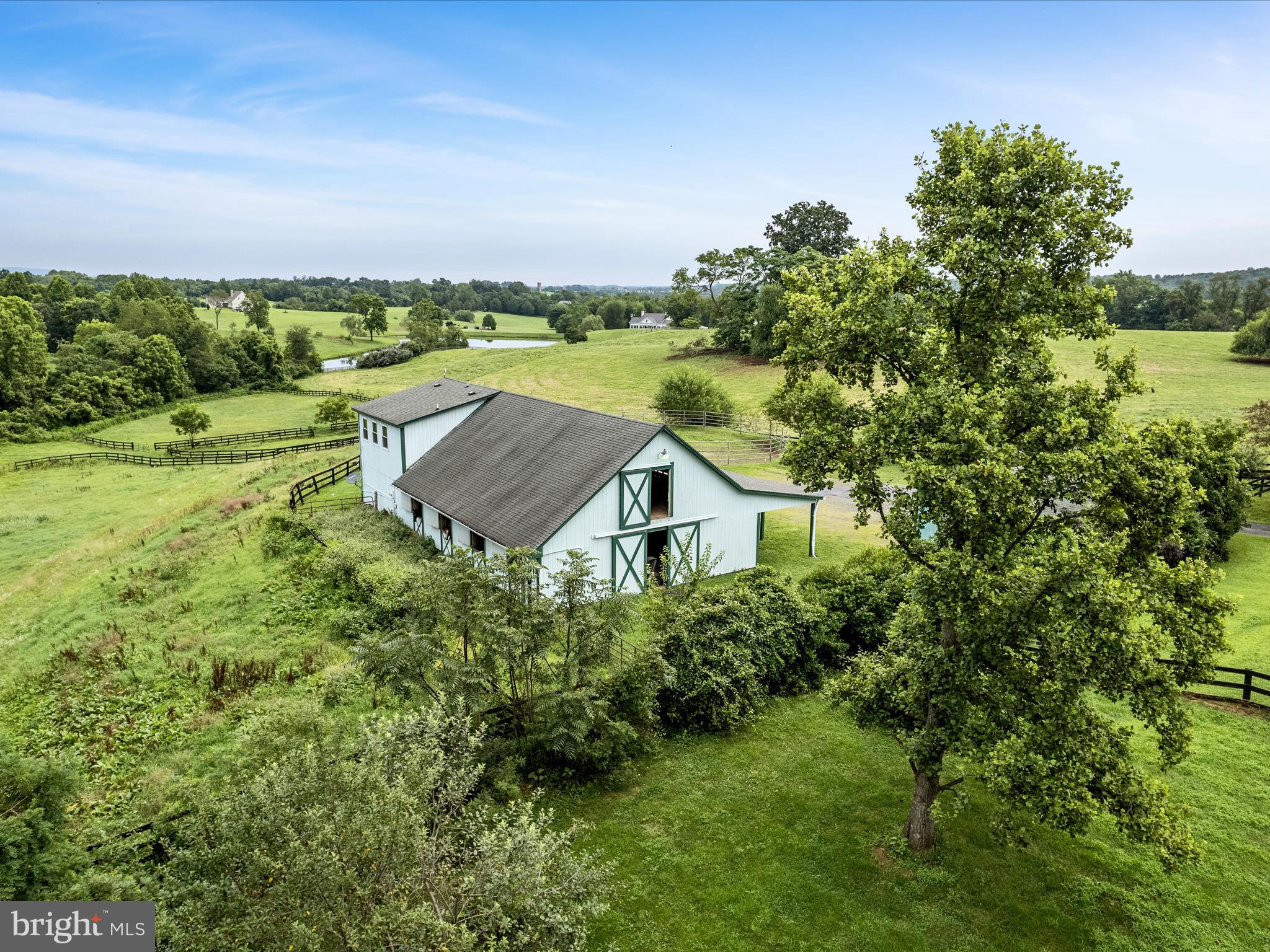 3959 Cobbler Mountain Road Delaplane, VA 20144 - Photo 71 of 106 an aerial view of a house with a yard and lake view