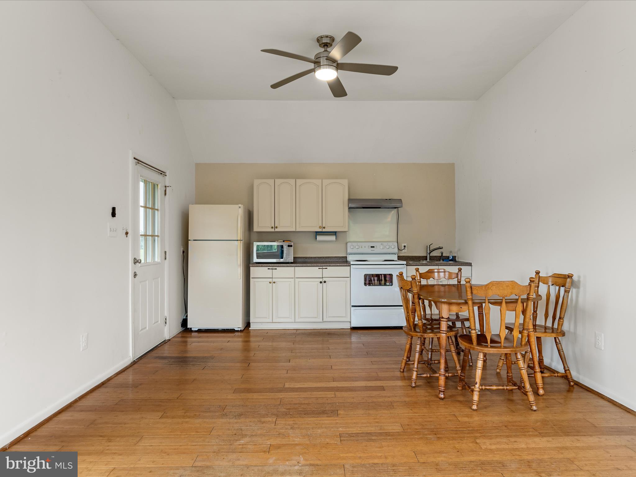 3959 Cobbler Mountain Road Delaplane, VA 20144 - Photo 81 of 106 a view of kitchen with cabinets and wooden floor