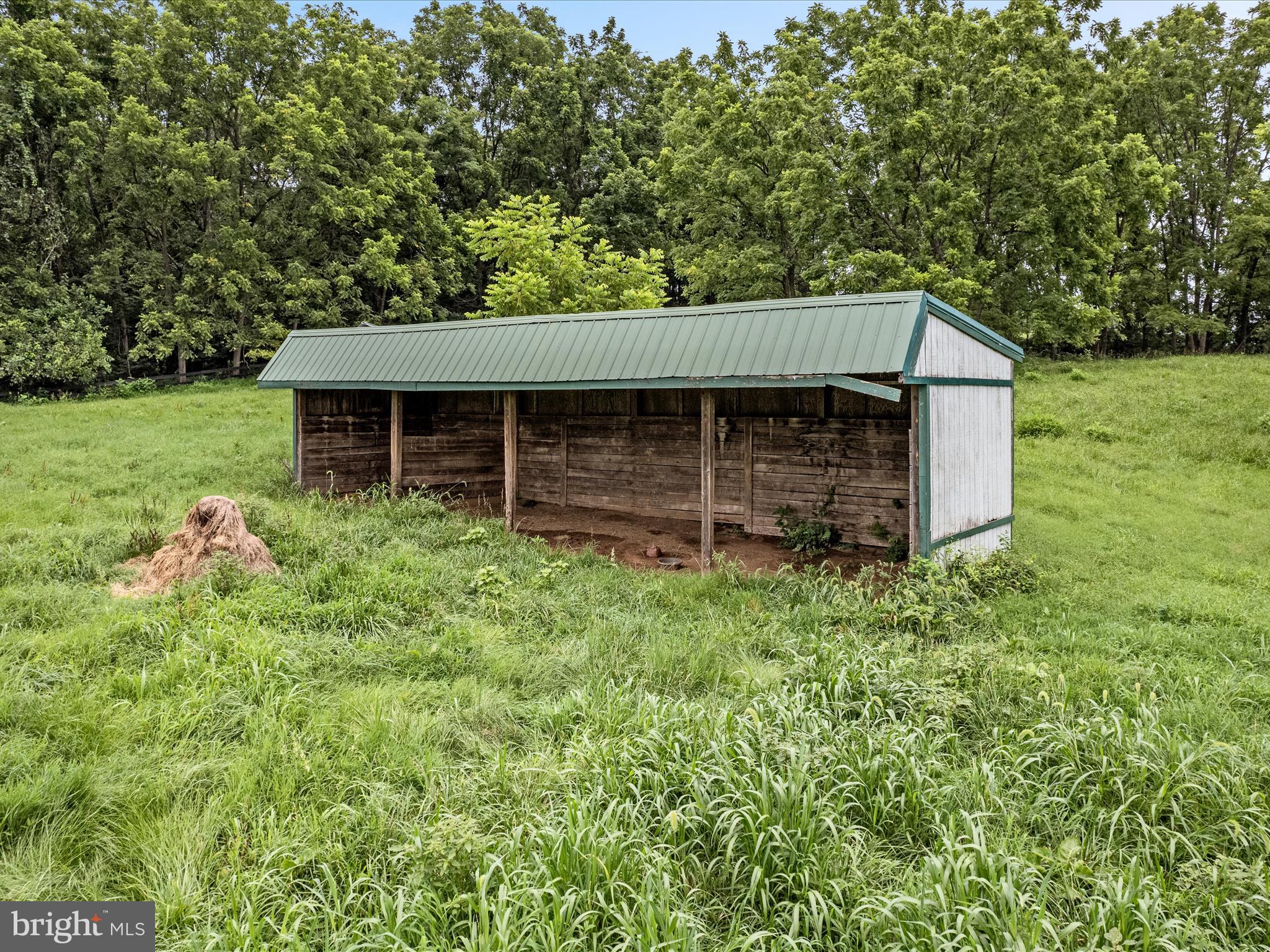 3959 Cobbler Mountain Road Delaplane, VA 20144 - Photo 90 of 106 a front view of a house with garden