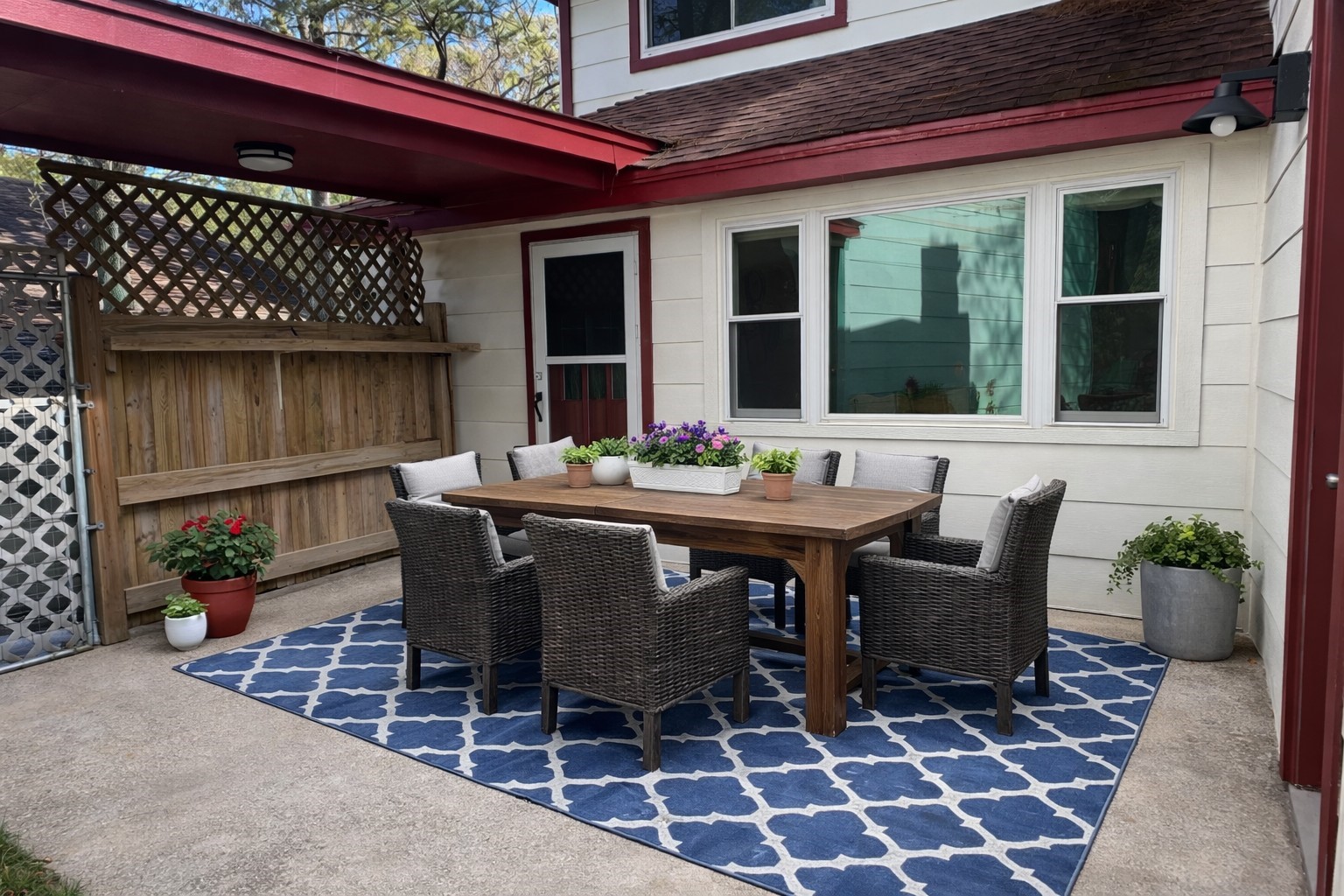 17423 Fairway Oaks Drive Spring, TX 77379 - Photo 25 of 50 a view of a patio with table and chairs