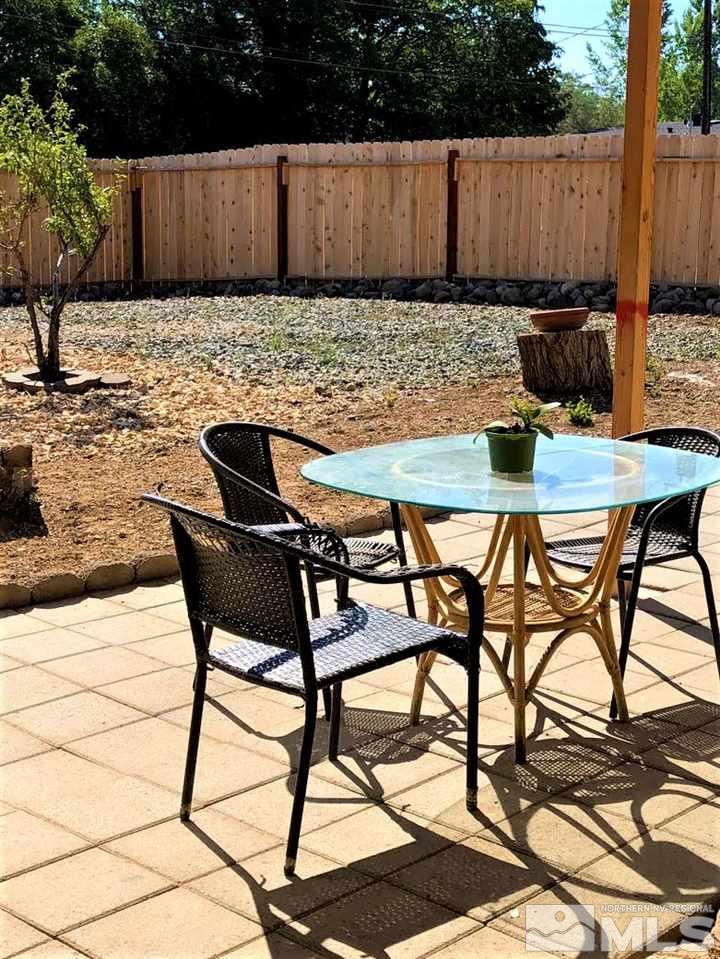 5220 Ural Street Reno, NV 89506 - Photo 14 of 19 a view of a chairs and table in the patio