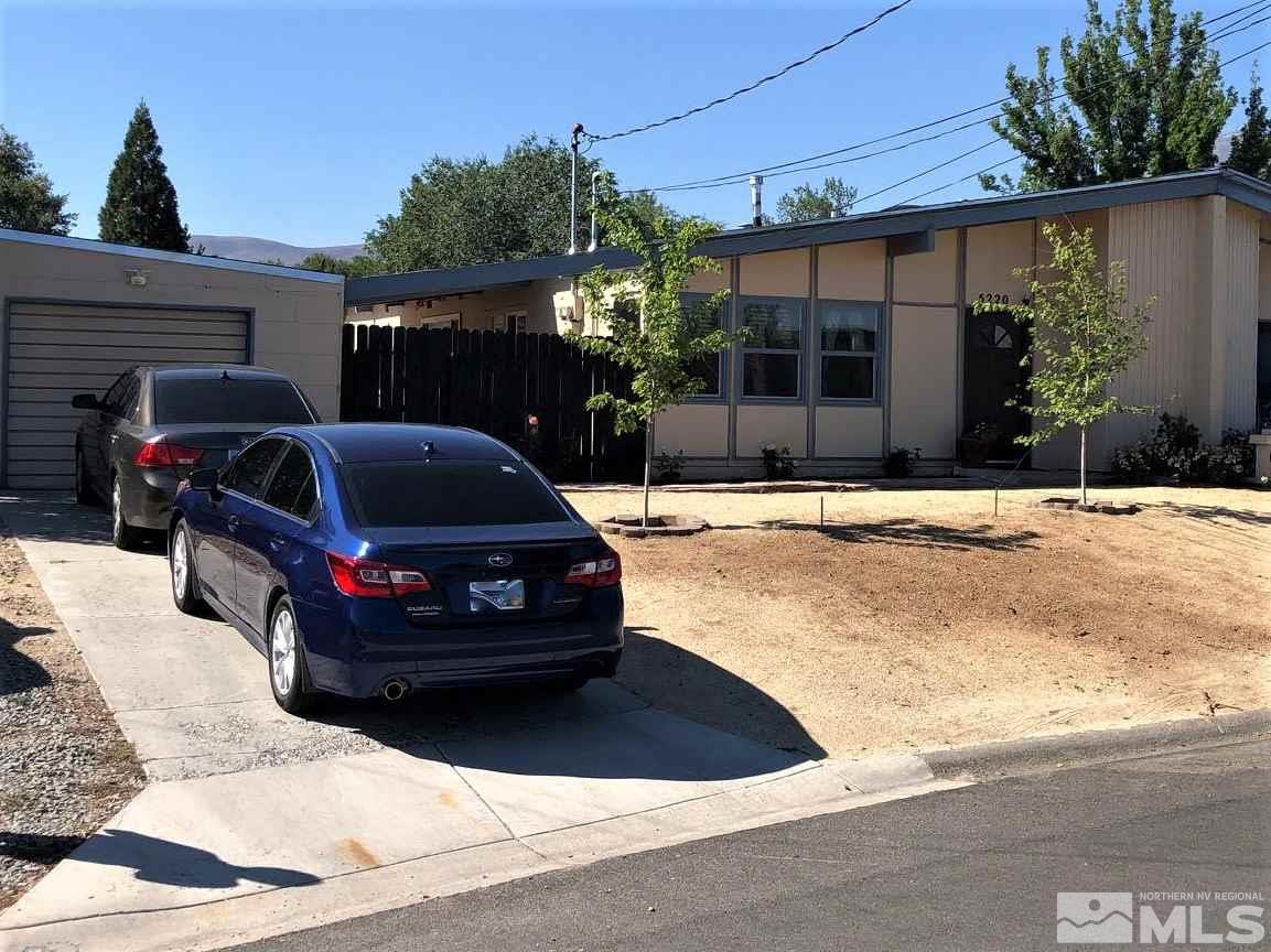 5220 Ural Street Reno, NV 89506 - Photo 3 of 19 a car parked in front of a house