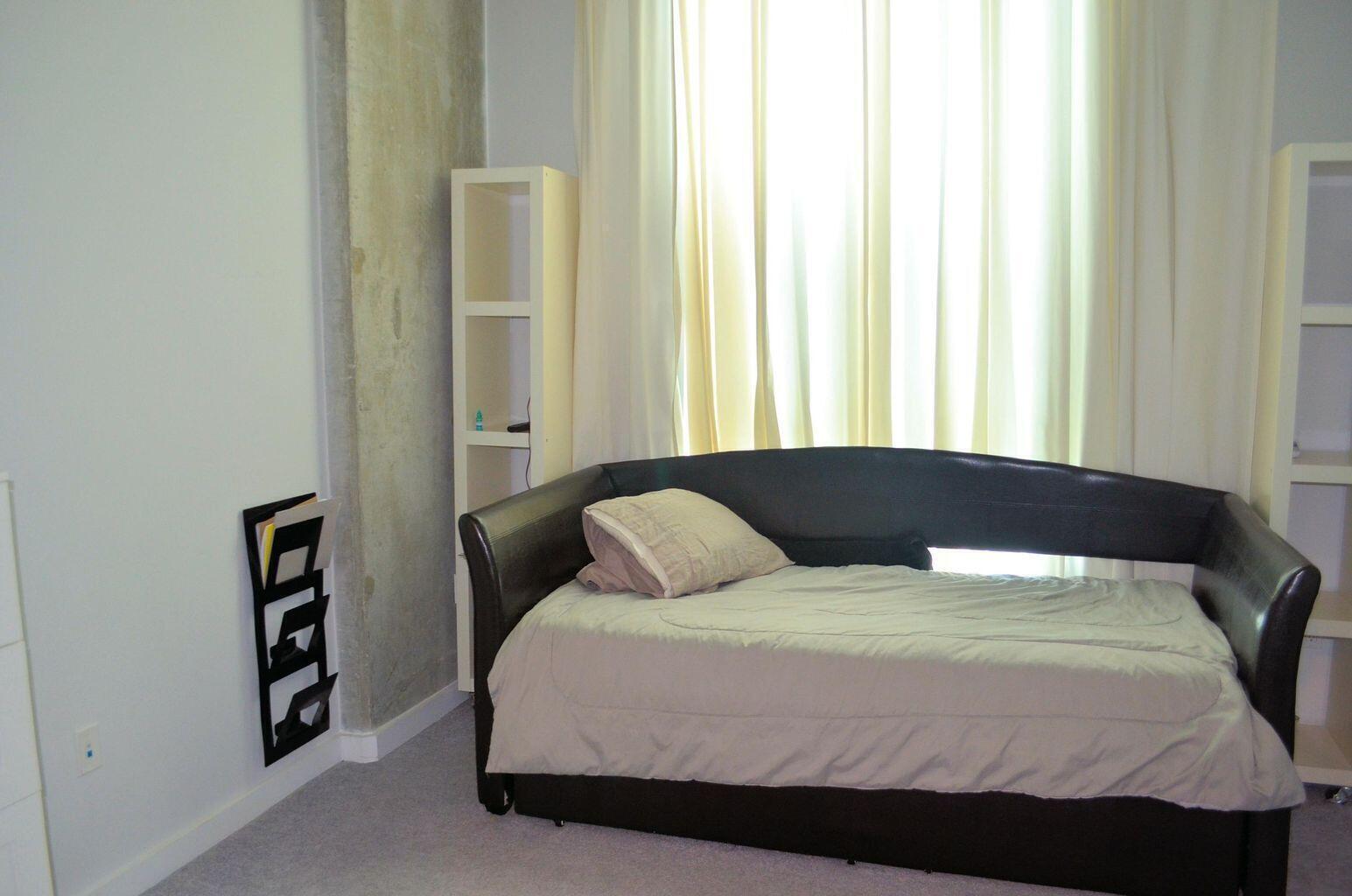 300 South Australian Avenue, Unit 1504 West Palm Beach, FL 33401 - Photo 20 of 27 a bedroom with a bed and a window