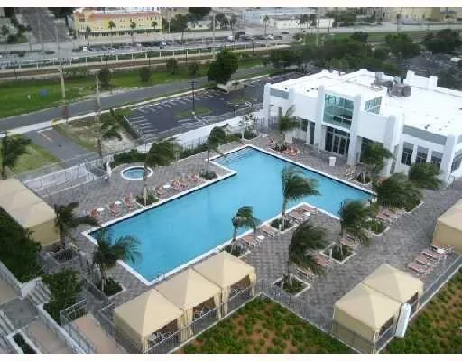 an aerial view of a house with a lake view