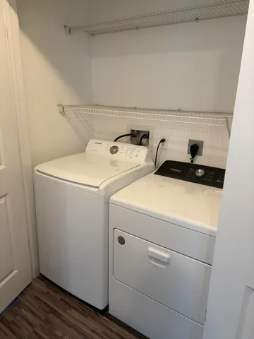 a utility room with dryer and washer
