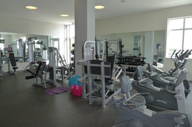 300 South Australian Avenue, Unit 1504 West Palm Beach, FL 33401 - Photo 8 of 27 a view of a room with gym equipment