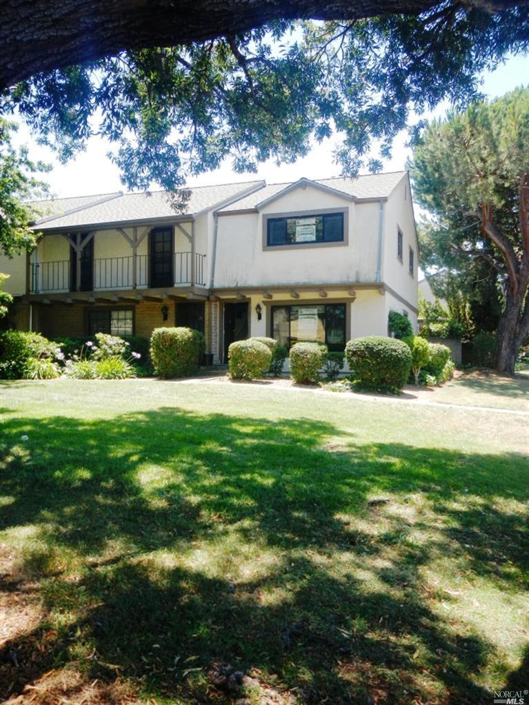 285 Playa Del Rey San Rafael, CA 94901 - Photo 1 of 1 a front view of a house with a yard and garage