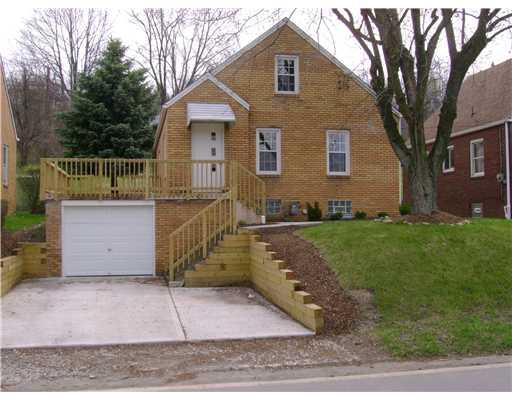 2313 Kane Road Aliquippa, PA 15001 - Photo 1 of 15 Exterior Front. NEW CONCRETE EXTRA WIDE DRIVEWAY AND RETAINER WALLS