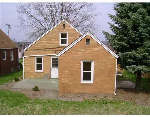 2313 Kane Road Aliquippa, PA 15001 - Photo 9 of 15 Exterior Back. OLD ROOF WAS REMOVED COVERING REAR PATIO