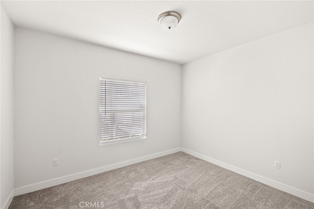 33064 Willard Street Winchester, CA 92596 - Photo 28 of 34 a view of an empty room with a window