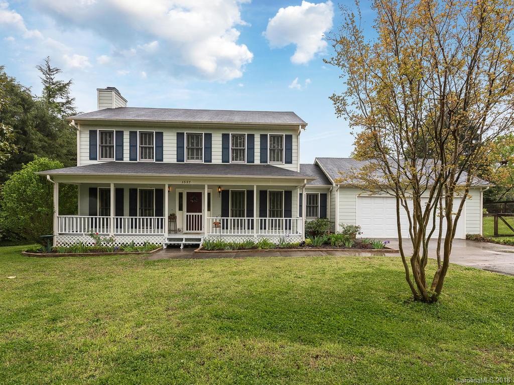 1527 Cobblestone Court, Unit 27A Fort Mill, SC 29708 - Photo 1 of 30 a front view of a house with a garden