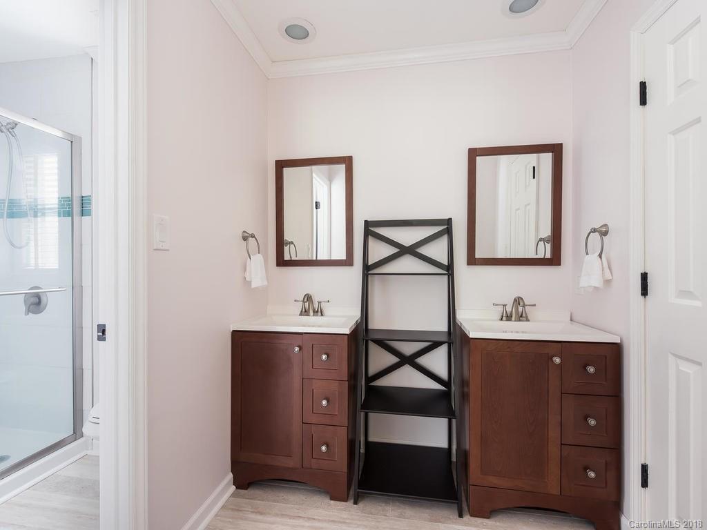 1527 Cobblestone Court, Unit 27A Fort Mill, SC 29708 - Photo 22 of 30 a bathroom with a sink and a mirror